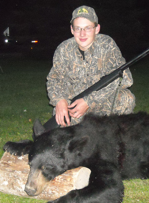American Black Bear Hunter With Trophy