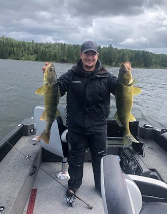 Corey Holding Pair Of Walleye Catches Aspect Ratio 330 422