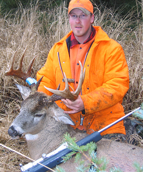Guest With Deer After Successful Hunt