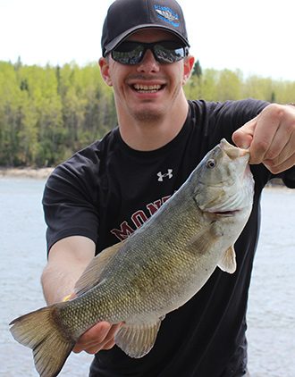 Guest Displaying His Huge Smallmouth Bass Catch Aspect Ratio 330 422