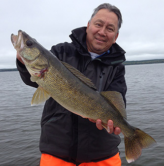 Guest With Huge Walleye Catch On Pakwash Lake